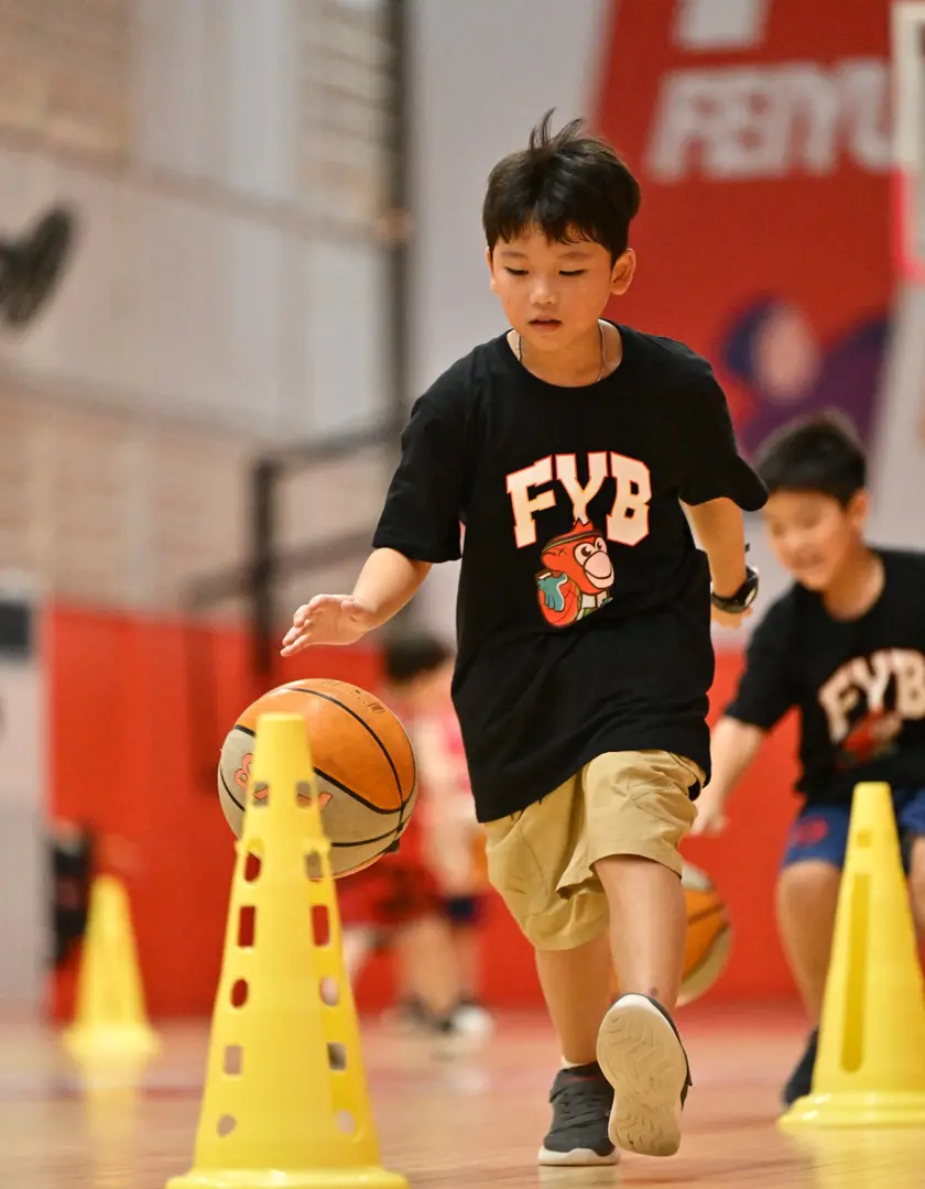 U10 player in a skills session