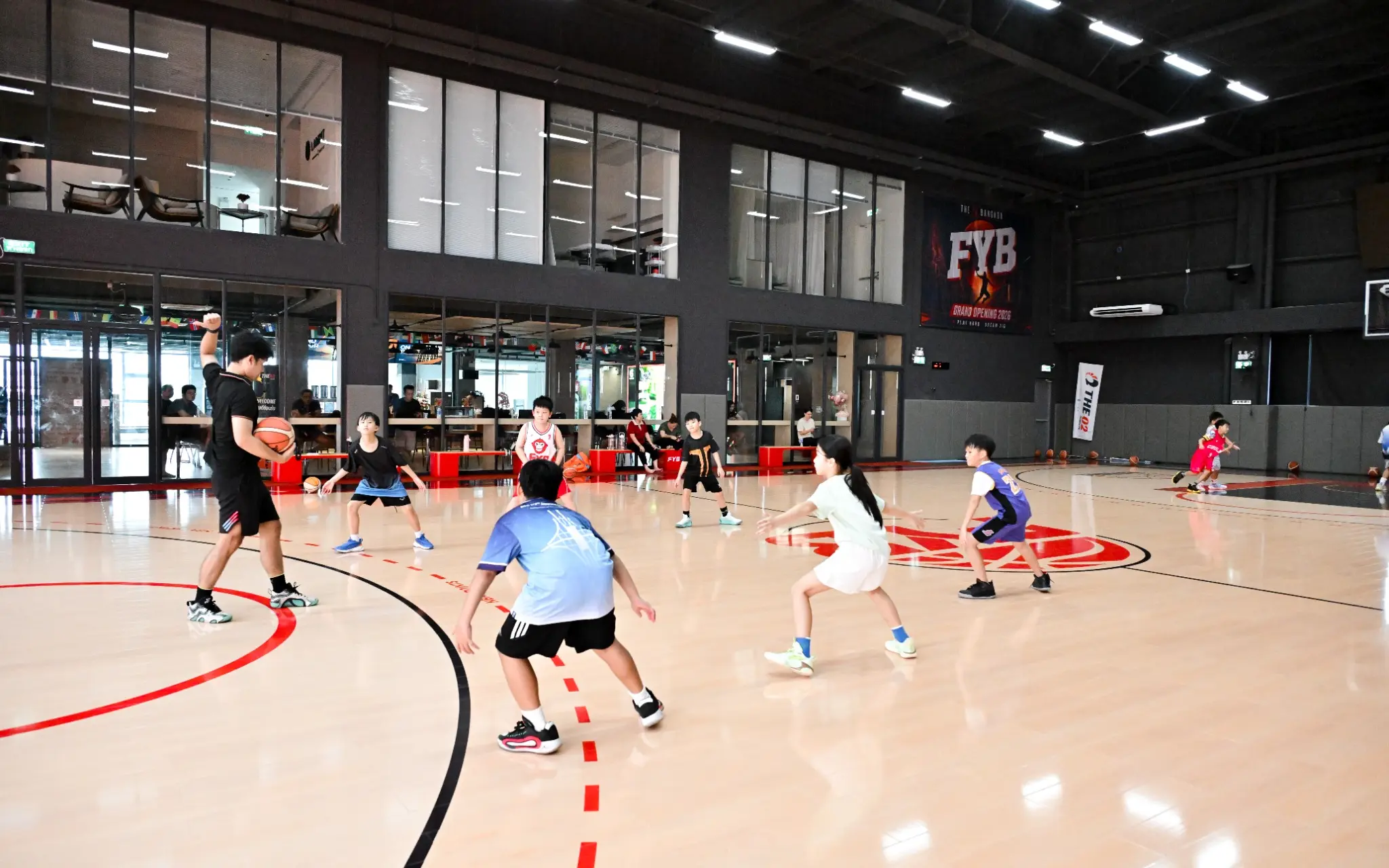 FYB youth players training on an indoor court